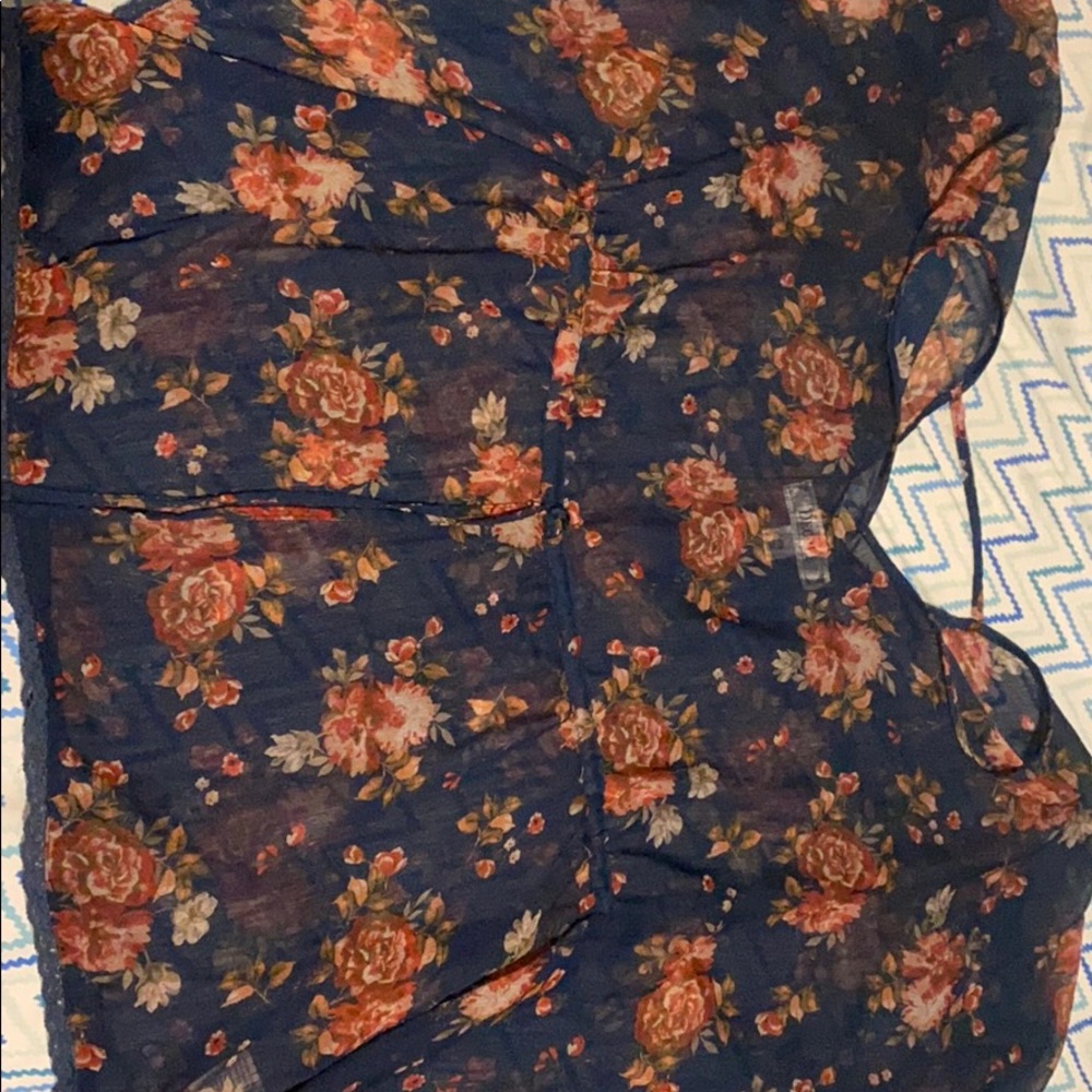 Loose floral top. It is also see through.